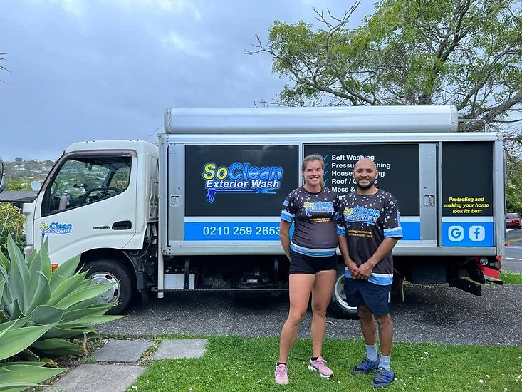 Luis and Sabina from SoClean Exterior Wash with their service truck