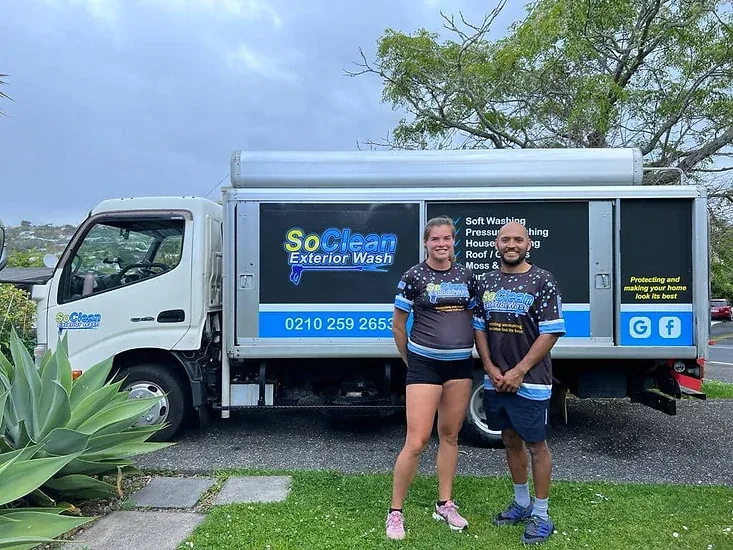 Luis and Sabina from SoClean Exterior Wash with their service truck